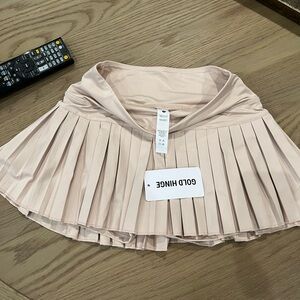 Gold hinge tennis skirt
